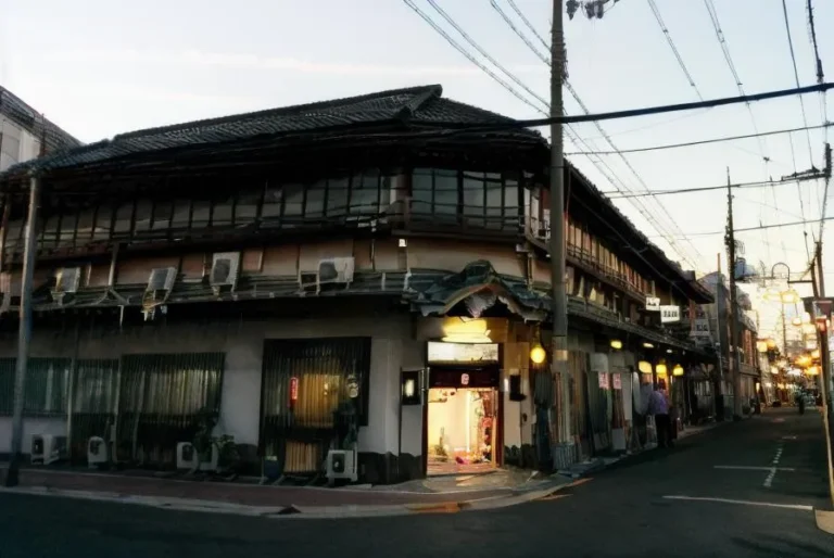 Traditional Japanese storefront on a quiet evening street, generated using Stable Diffusion AI.