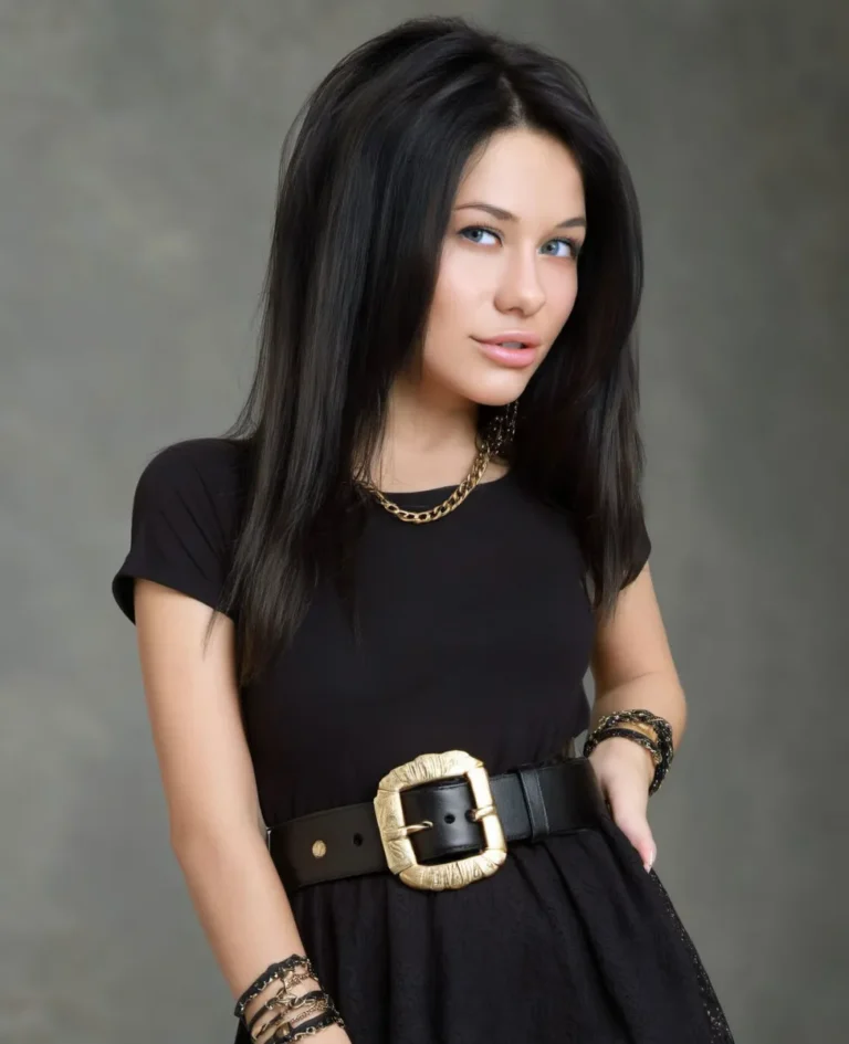 A stylish woman with long black hair wearing a black dress and gold accessories, generated using stable diffusion.