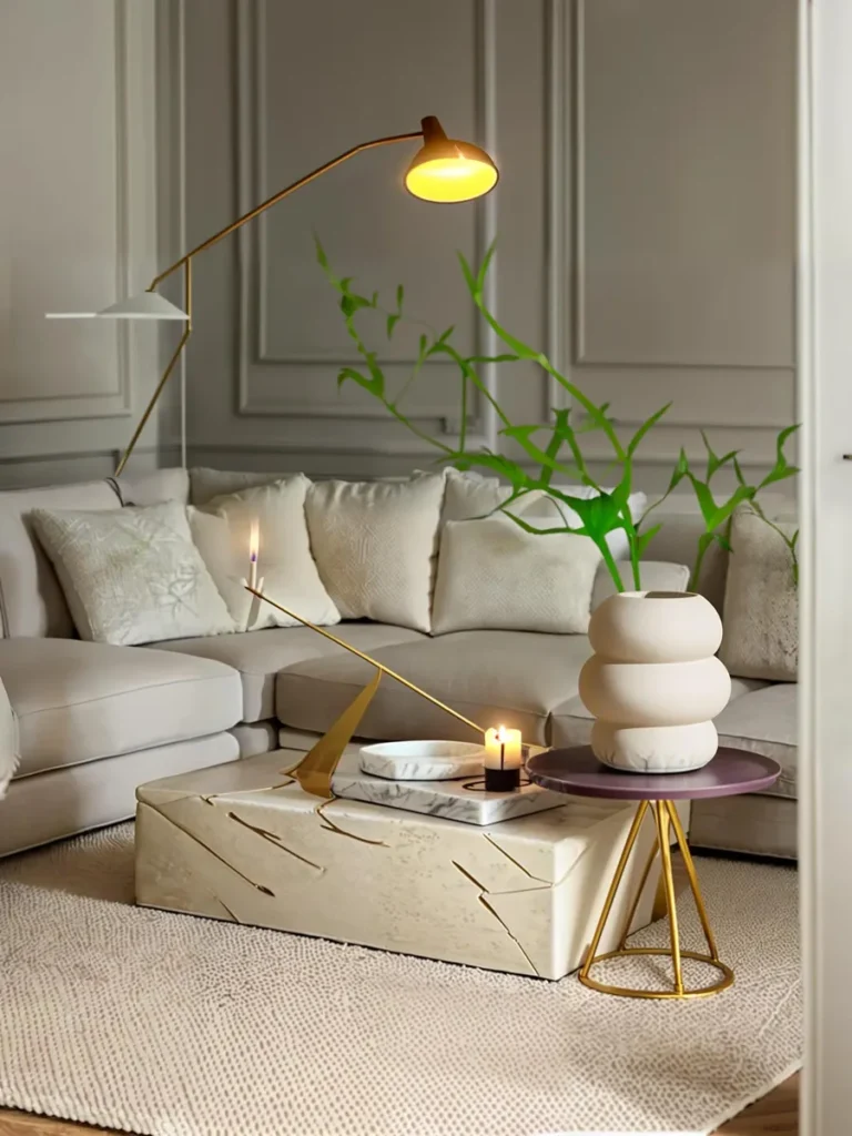 A modern living room featuring a beige sectional sofa, unique gold floor lamp, abstract coffee table, and round side table with a stacked ceramic vase. This is an AI generated image using Stable Diffusion.