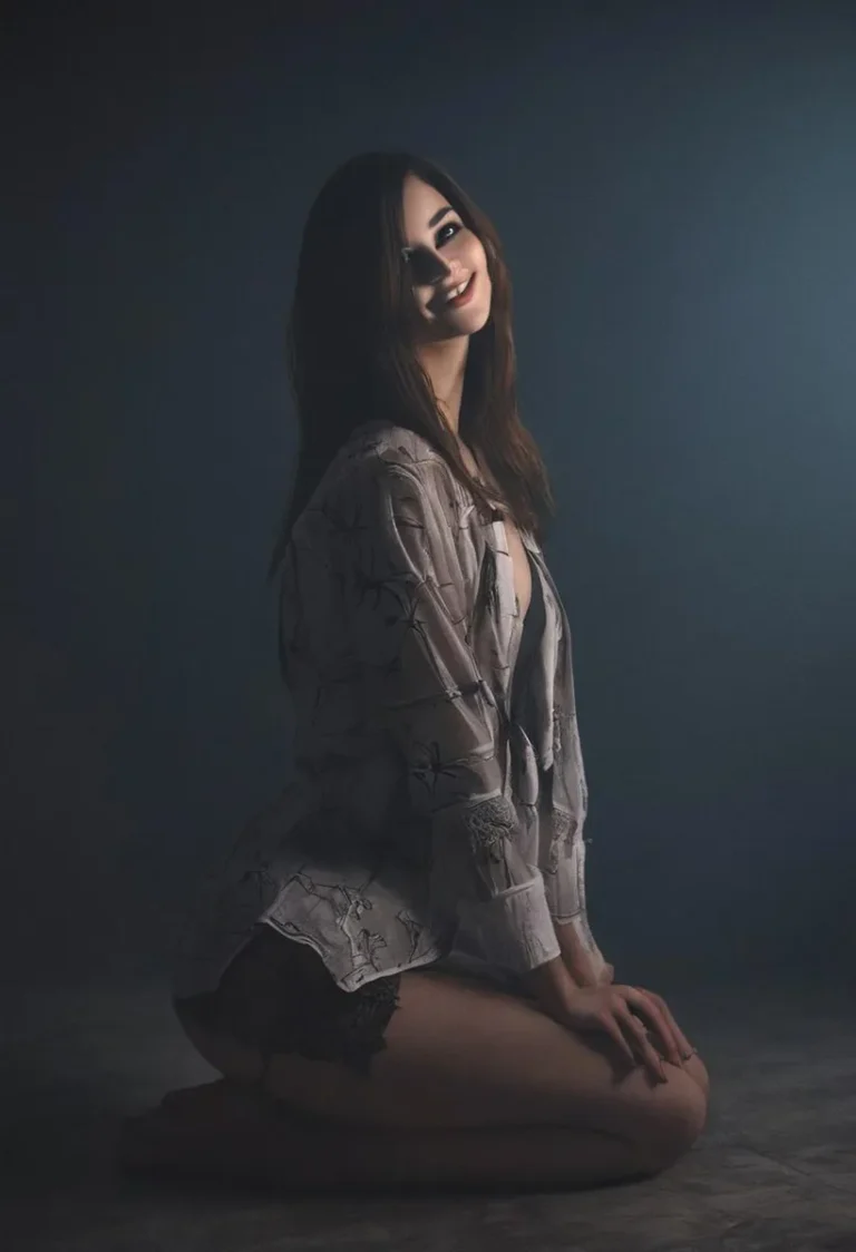 A sultry woman with long hair kneels down with soft lighting, created using stable diffusion.